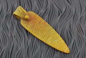 Here is the pendant directly after firing.  It is sitting on the texture tile (Body Wave).